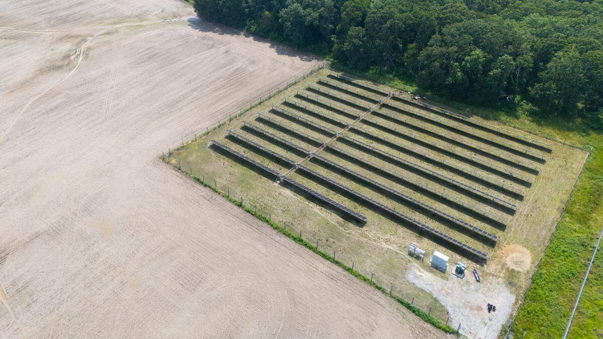 Aerial view of a 3-acre solar farm in Salem, Ill., where local farmers have partnered with solar companies to provide grazing and landscaping.