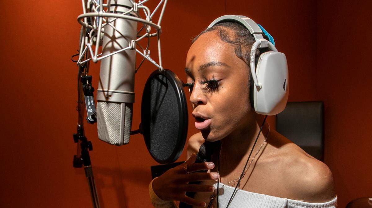 Jordyn Powell, better known as Jaiimoni Starr, runs through a song in the recording studio at Shock City Studios in St. Louis. A viral Tik Tok video laid the foundation for the East St. Louis native’s budding rap career.