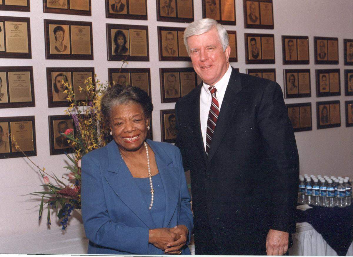 McKendree University President James Dennis poses with author and civil-rights activist Maya Angelou in 2003, when she appeared as part of its Distinguished Speaker Series.