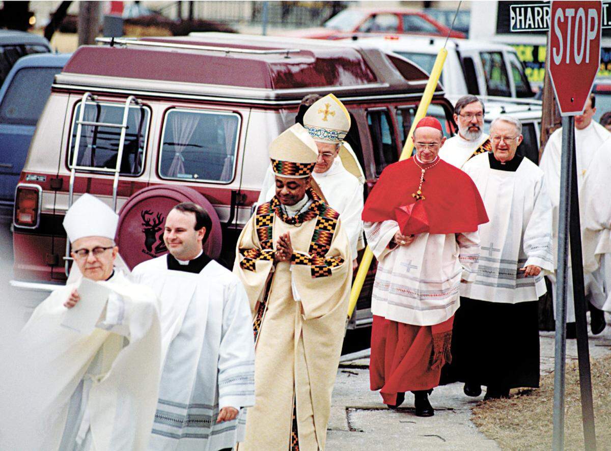 Auxiliary Bishop Wilton D. Gregory wore African kente cloth for his installation as bishop of the Catholic Diocese of Belleville on Feb. 10, 1994. This procession includes Cardinal Joseph L. Bernardin, now deceased, in red.