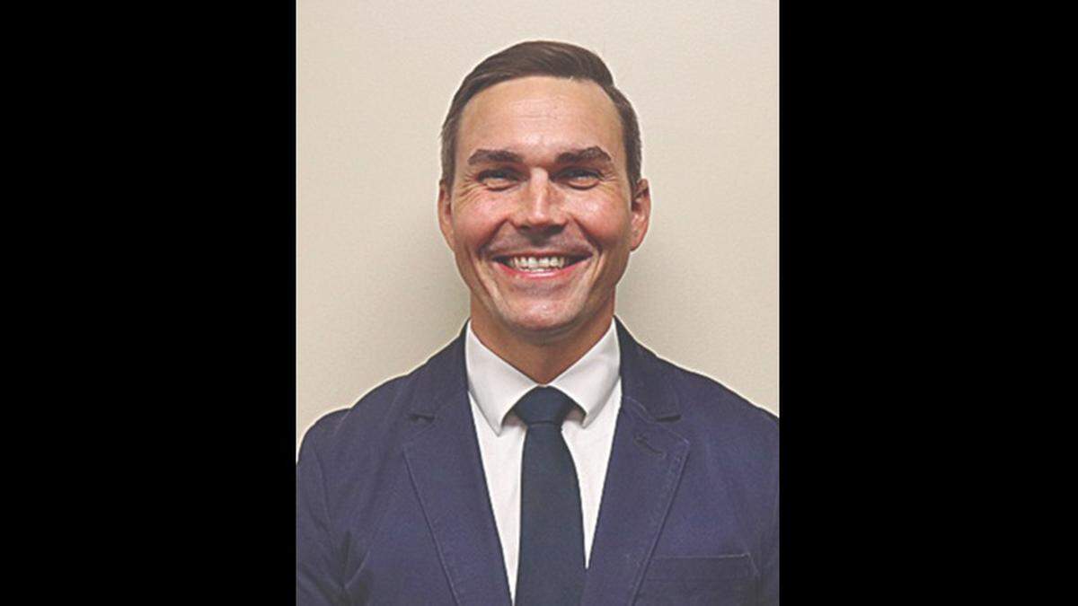 Timothy J. Harmon is the new principal of Marquette Catholic High School in Alton.