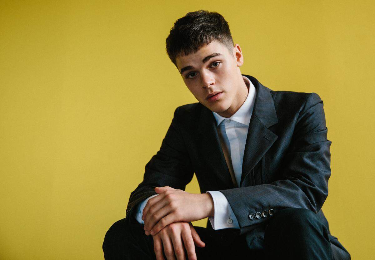 Former Belleville West student A.J. Mitchell, 17, who now lives in Los Angeles, poses for a publicity shot. He signed a contract last year to record four albums with Epic Records.