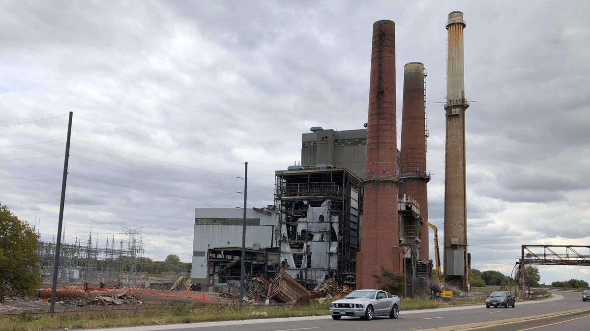 Demolition of the former Wood River Power Plant in East Alton has been progressing since this October 2020 photo was taken. Explosives will be used Monday February 1, 2021 to drop the three smoke stacks at the power station located on Illinois 143.
