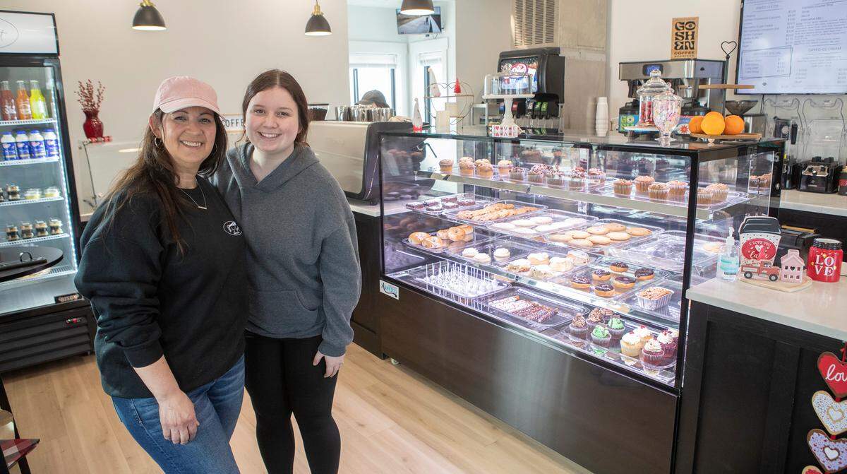 Oh So Sweet Bakery & Café owner Cheri Mansfield and her youngest daughter Samantha Mansfield in their shop in Carlyle, IL. They serve a variety of coffees, drinks, sweets, ice cream, cookies, donuts, breads, cupcakes, and do custom orders for parties, weddings, birthdays.