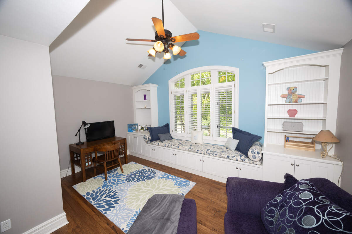 Each bedroom on the top floor comes with a custom built-in bed platform overlooking a window.