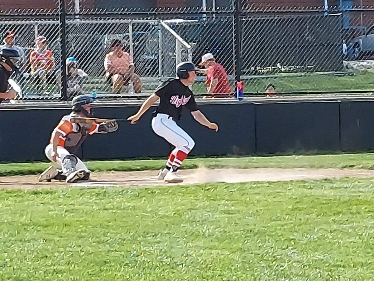 Highland junior outfielder Jake Ottensmeier rips a double to left field during a Mississippi Valley Conference game at Waterloo High School on Wednesday, April 19. Ottensmeier had three hits — including two doubles — in Highland’s 4-3 loss to Waterloo.
