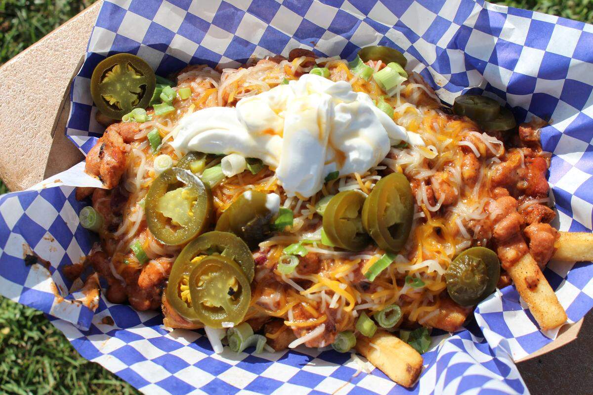 The Burgers STL food truck serves seasoned fries plain or smothered in chili, cheese, scallions, jalapenos and sour cream.