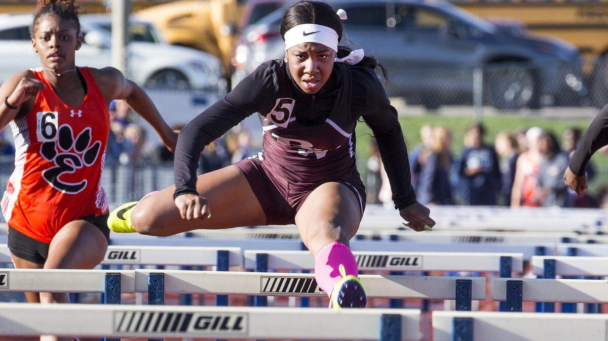 Belleville West’s Kelvi Searcy during the 100 Meter Hurdles at the O’Fallon Girls Invitational Track Meet Friday in O’Fallon . Photo: Chris Johns