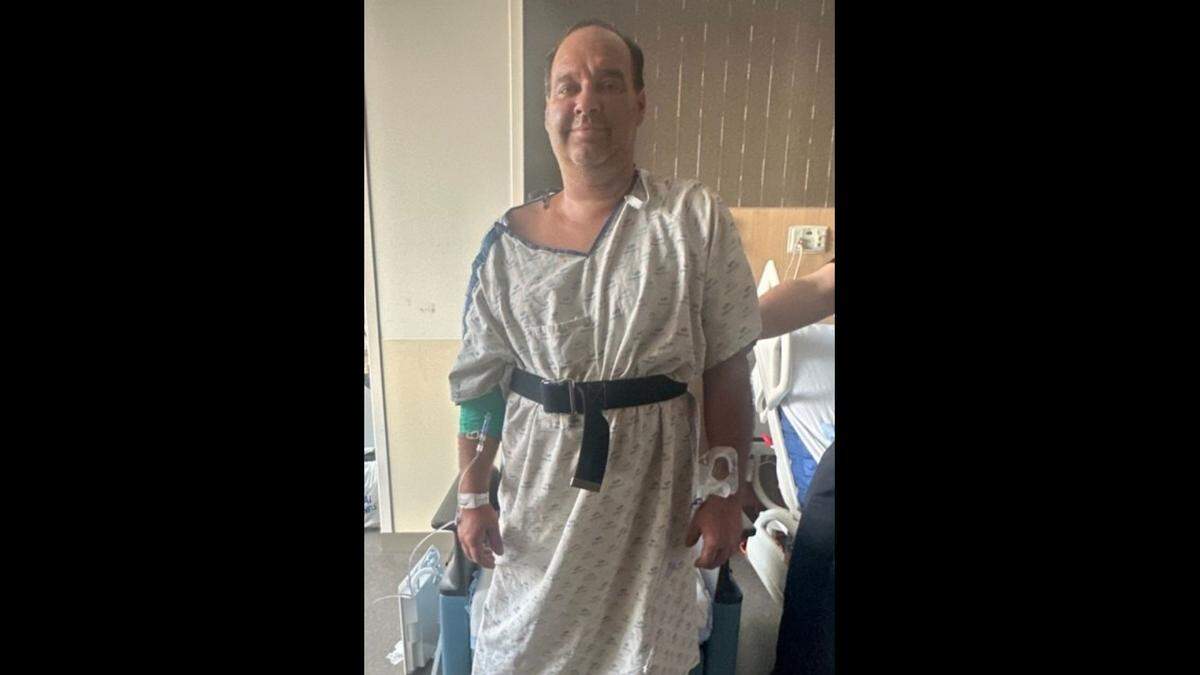John Davis in the hospital after he was impaled by a pole in a mid-November accident.