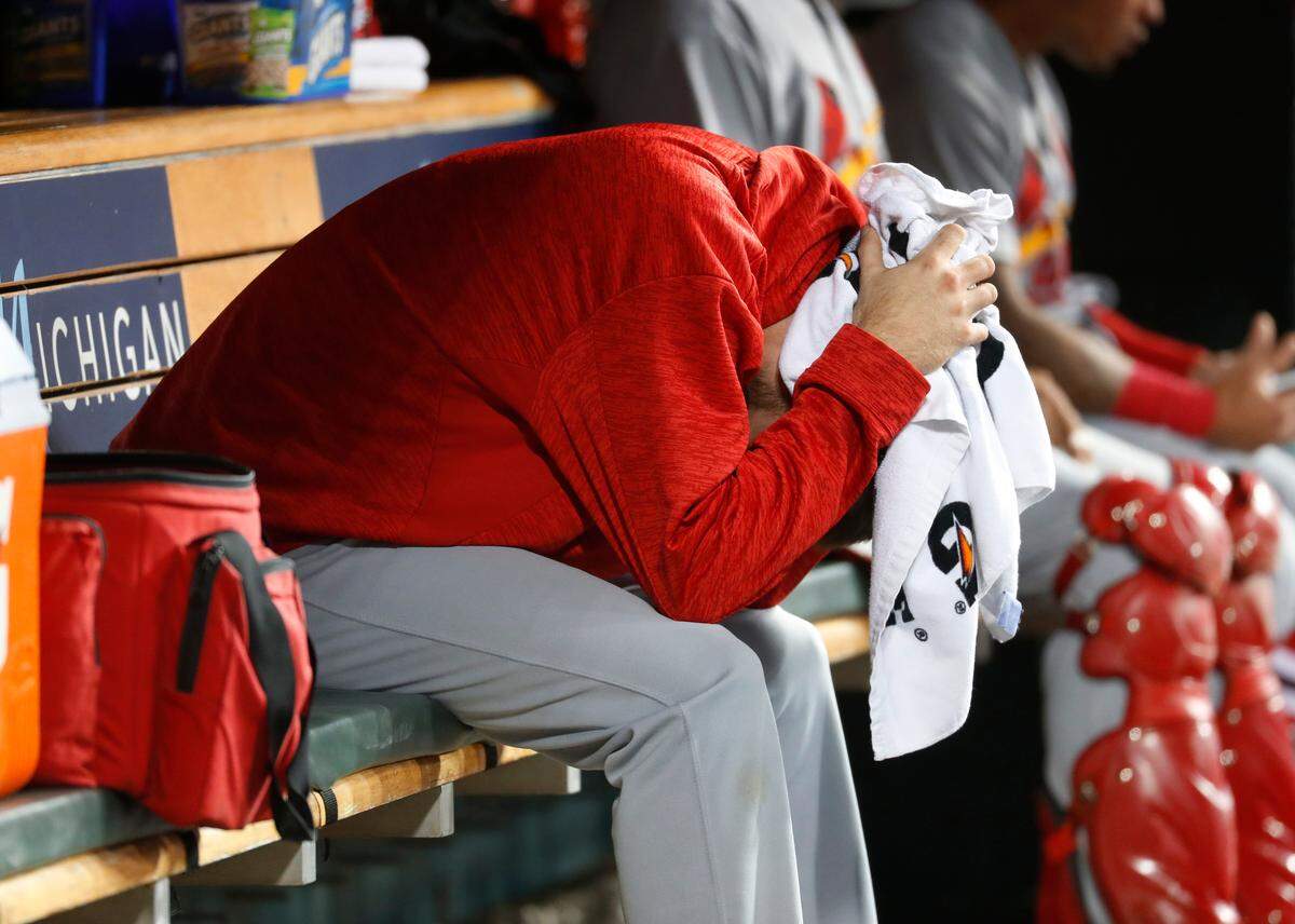 Pitcher Austin Gomber sits on the bench in the sixth inning of a game in Detroit on Sept. 7. He’s part of a deep staff that will return to St. Louis in 2019.