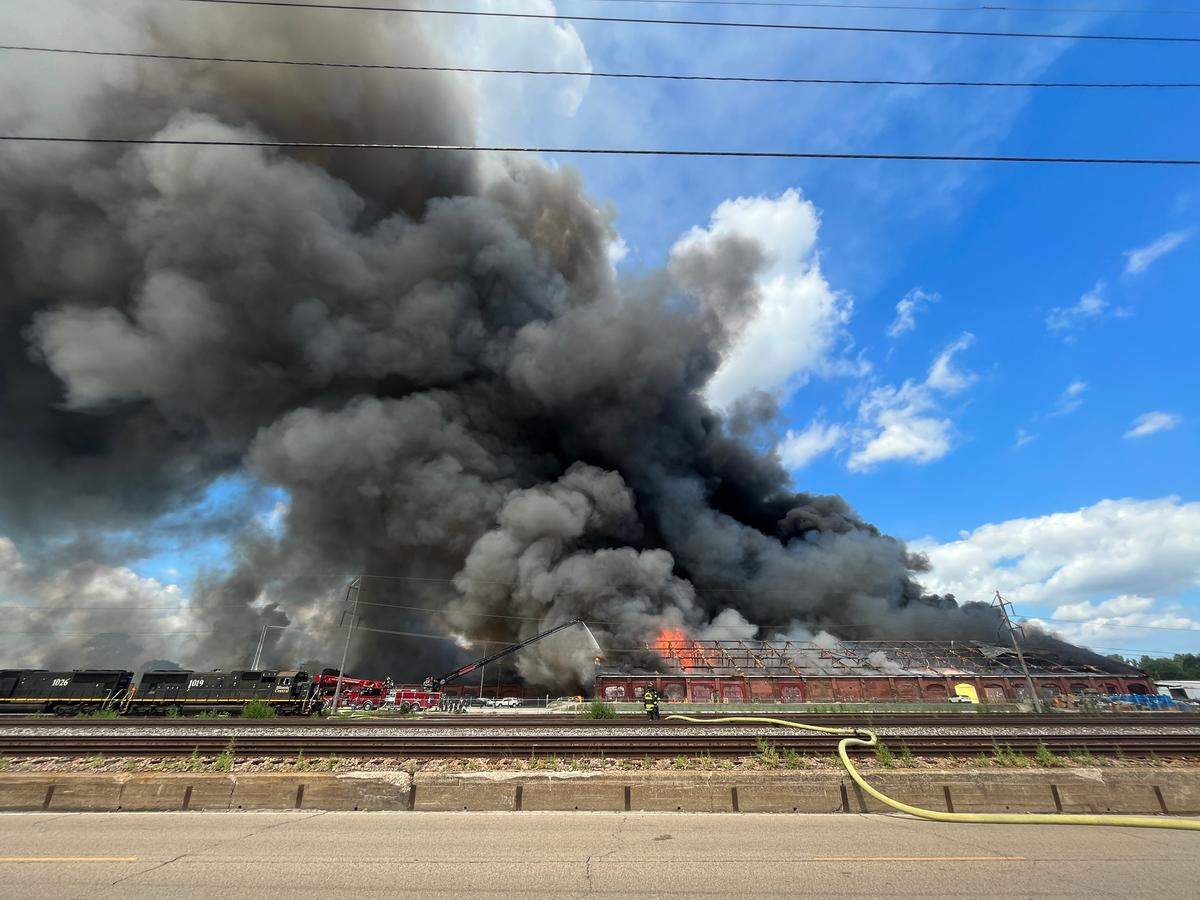 Black smoke from a fire in a Madison industrial park can be seen for miles across the metro-east and St. Louis.