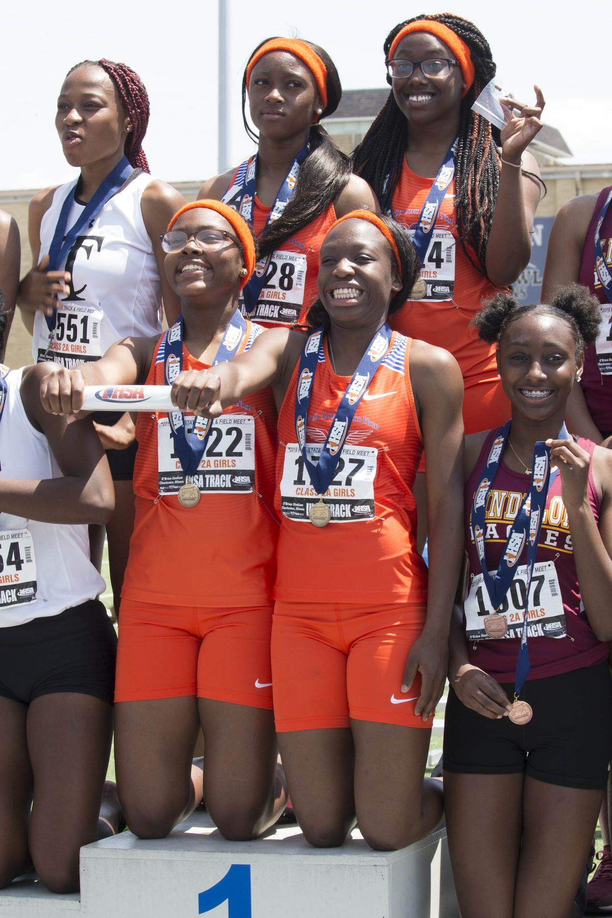 May 18, 2019 - Charleston, IL - East St. Louis’ Veronica Sherrod, Markia Lampley, Jariah Turner and Faith Mitchell after winning the Class 2A 4x100-Meter Relay Championship race at the IHSA Track and Field State Finals on Saturday. [Photo: Chris Johns/PhotoNews Media]