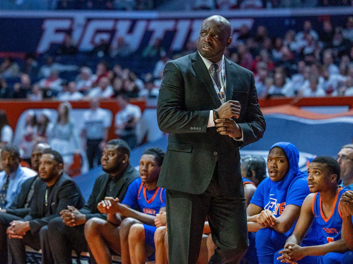 East St. Louis boys basketball head coach Mark Chambers coaches his team during Friday’s IHSA Class 3A state semifinal game against Metamora. Chambers has had a very successful run as the Flyers coach.