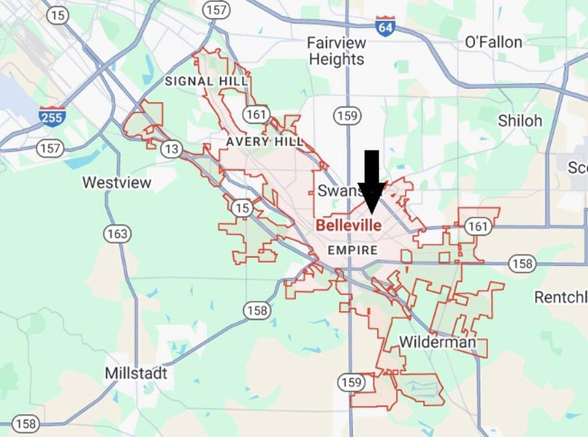 An arrow points to the approximate location where a contractor for the city of Belleville (red border) ran out of oil and chip rocks to resurface alleys. The contractor had started on the west side and worked east.