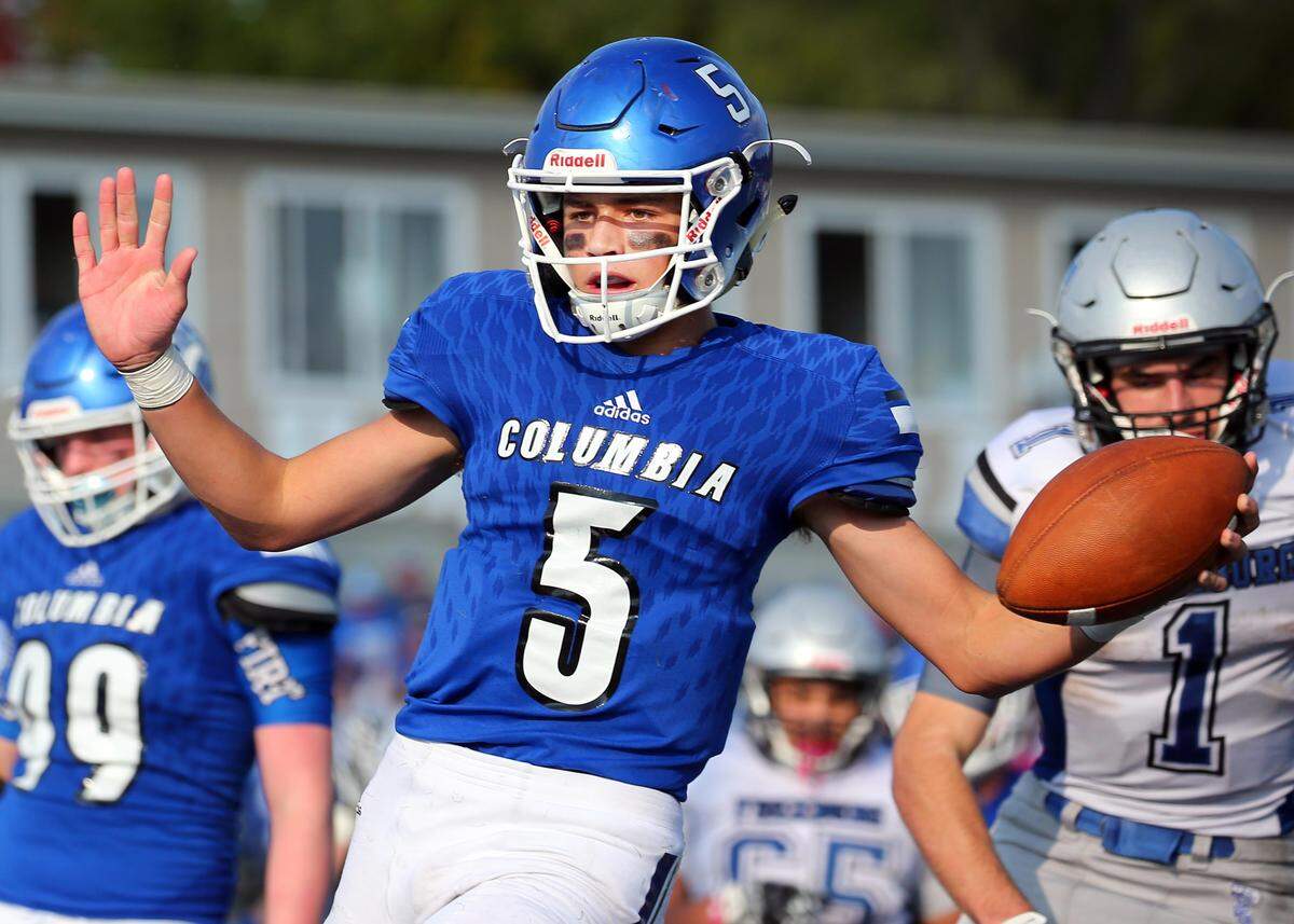 Nic Horner celebrates after scoring the go-ahead touchdown during the third quarter of the first round IHSA Class 4A playoff game between Columbia and Freeburg Saturday.