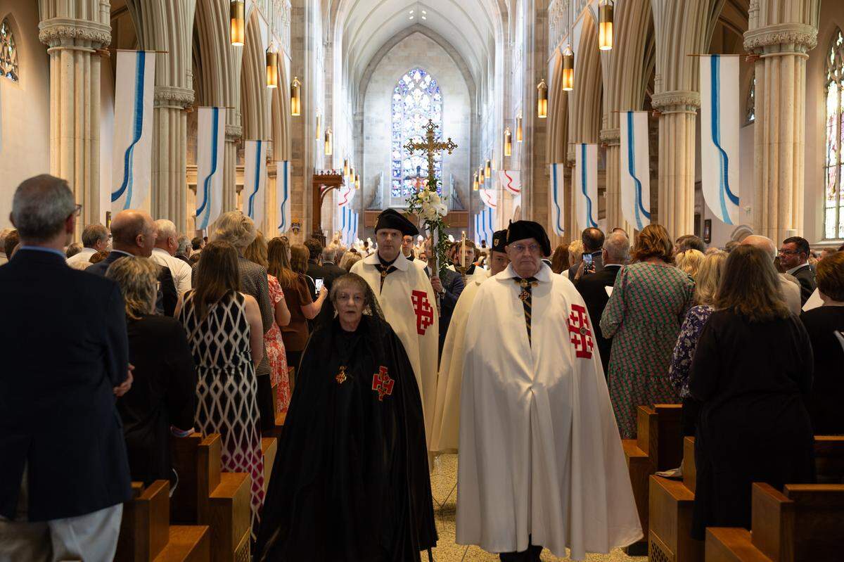 The Equestrian Order of the Holy Sepulchre of Jerusalem was among the Catholic organizations in a procession for the installation of the Rev. Godfrey Mullen as bishop of Belleville on Friday.