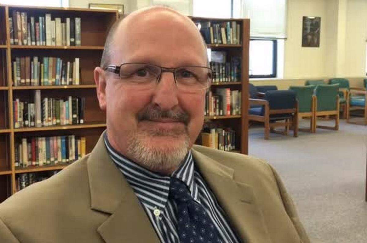 Dave Harris, who is retiring as principal at Althoff Catholic High School in Belleville, is shown in a screen shot from a 2016 video.