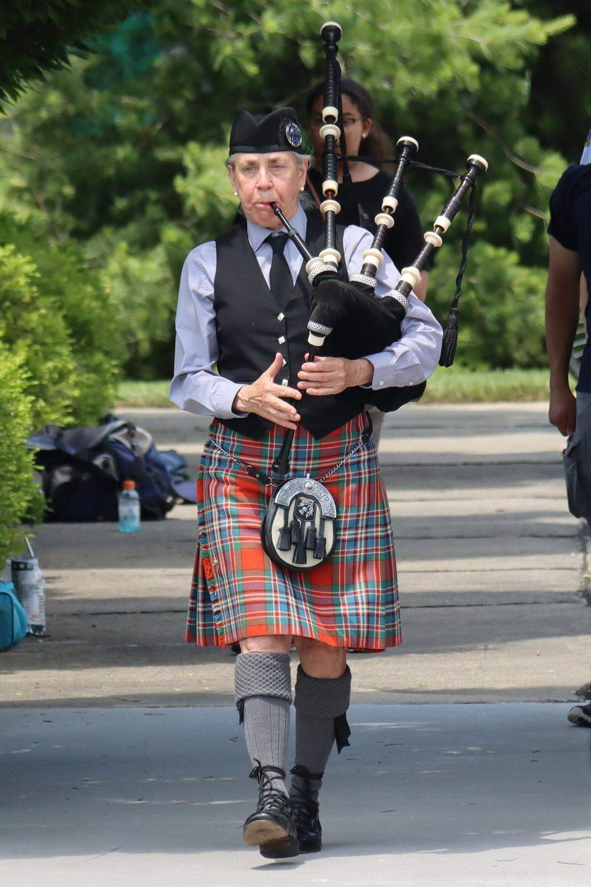 Laurie Hartung plays the bagpipes during the Memorial Day program in O’Fallon. More than 150 spectators attended the event at the O’Fallon Veterans’ Monument sponsored by the city and the monument association this year.