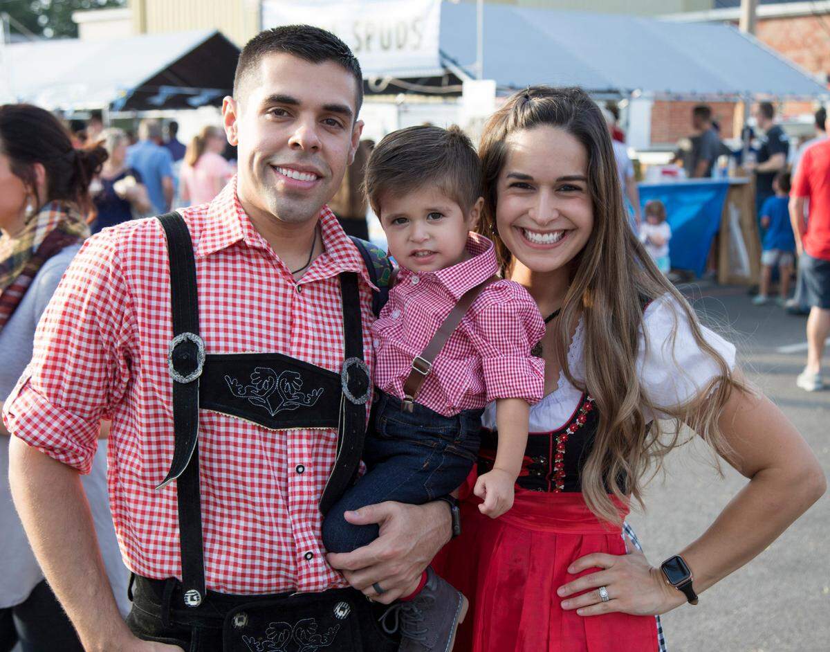 A young family enjoying the Oktoberfest fun