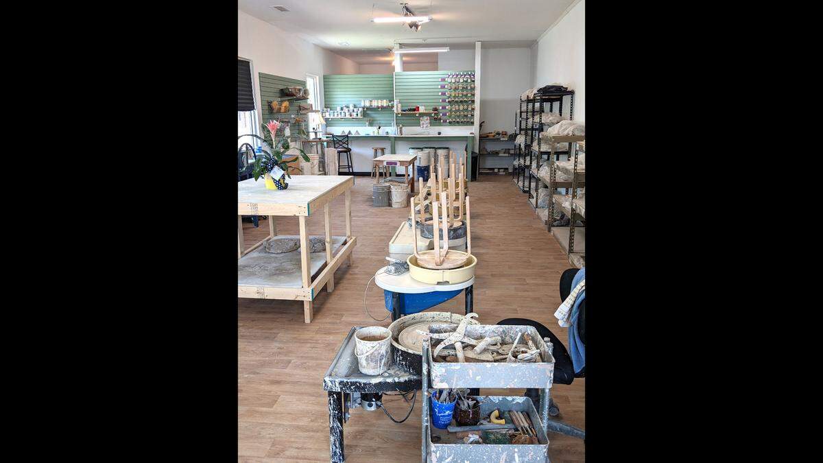 The studio side of Weave & Wobble at 1537 Donna Drive in Belleville includes multiple pottery wheels, shelving to store projects, tables to prepare and weigh clay, and mix glazes.