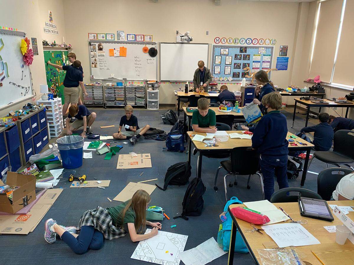 In their first year as an organization, members of the Innovators Club at St. Clare School in O’Fallon were among the top place finishers at the People of Play’s 17th Annual Young Inventor Challenge at Radio Flyer Headquarters in Chicago last month. Club members are pictured here working on a project.