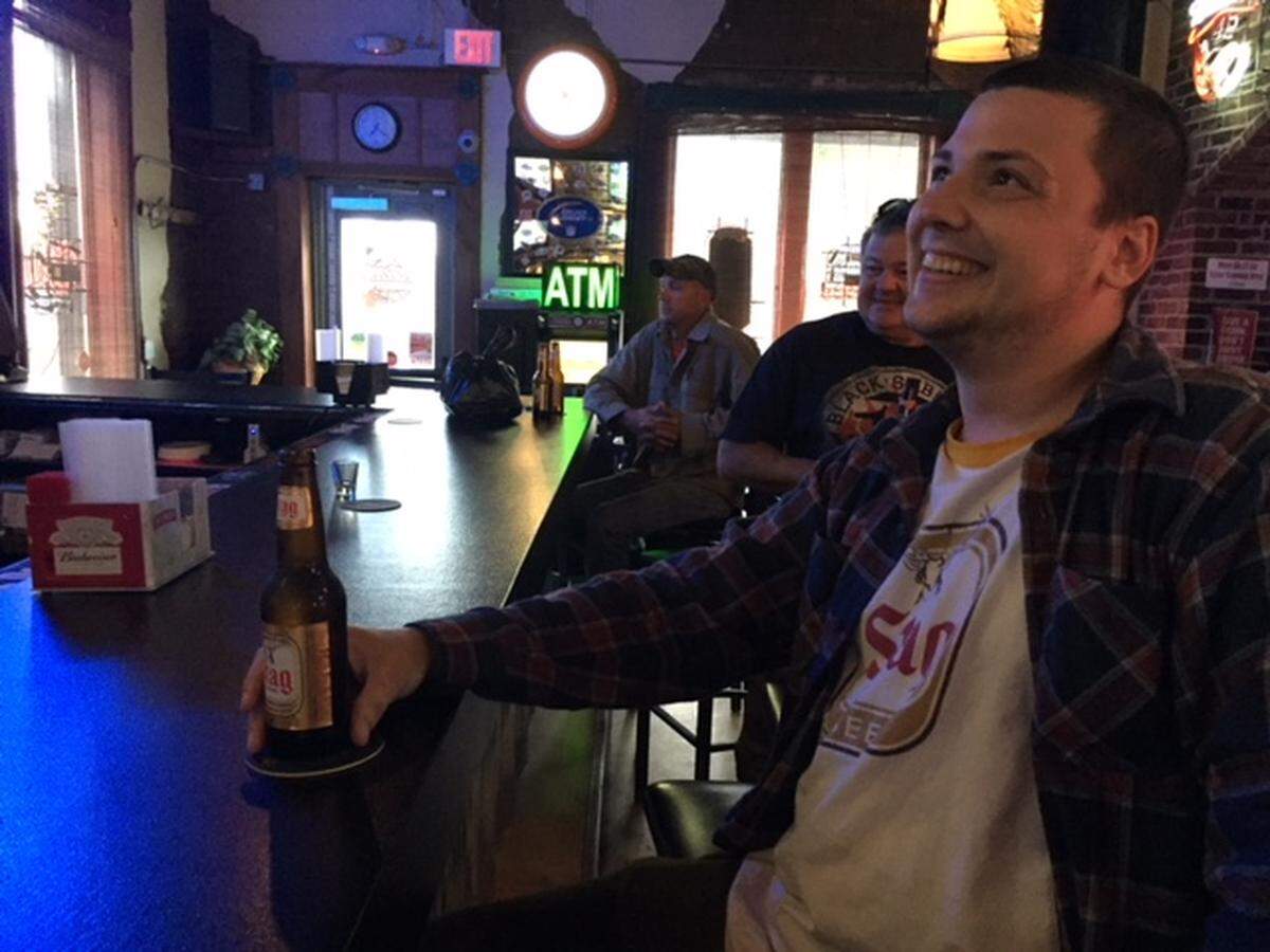 Will Hoey enjoys a Stag Beer at The Corner Chill & Grill in Belleville. Hoey said if Stag changes its label he will still drink the beer as long as the taste is not altered. A Stag spokesman said the recipe will not be changed.
