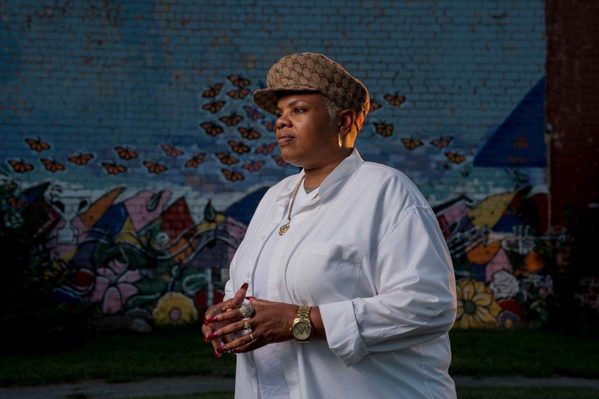 Terra Jenkins still feels connected to the gang she joined as a teenager in the late 1980s. She has experienced a metamorphosis in recent years, though, calling herself a problem solver who wants to see the community thrive again. (Whitney Curtis for KHN)