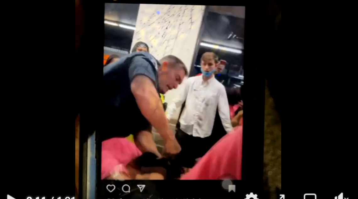 A screenshot from a video posted to social media of a Fairview Heights police officer using force to break up a fight at SkyZone. Police said they are investigating the officer’s use of force.