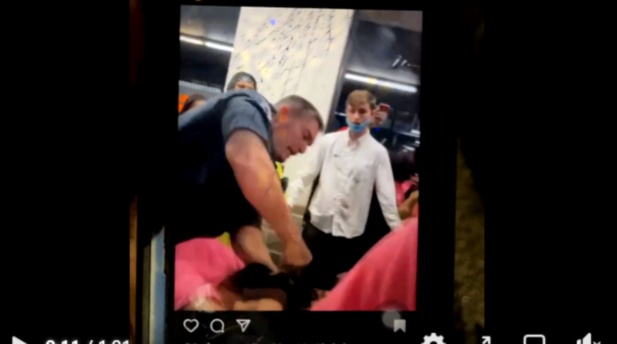 A screenshot from a video posted to social media of a Fairview Heights police officer using force to break up a fight at SkyZone. Police said they are investigating the officer’s use of force.