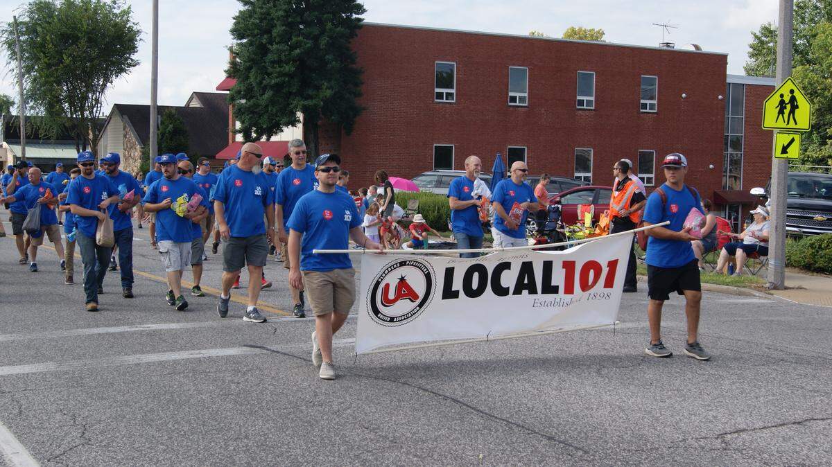 Members of Local 101 union march along South Illinois Street in the annual Belleville Labor Day parade in this file photo.