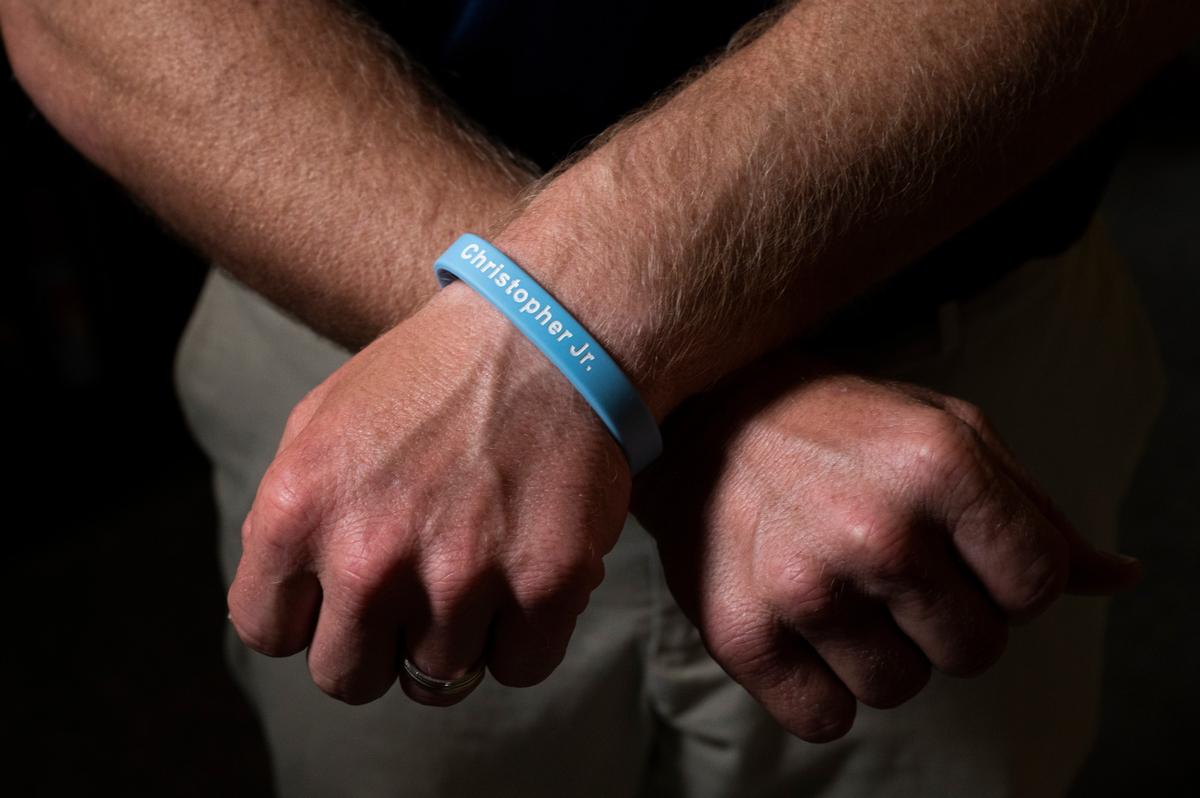 Christopher Schlachter Sr., wears a bracelet in memory of his son, Christopher Schlachter Jr., in O’Fallon. In order to carry on his name, Schlachter Sr. started the Christopher Jr. Legacy for Drowning Prevention program in 2016 in partnership with the YMCA in O’Fallon and since its inception, the program have provided swimming lessons and educated over a thousand families on proper water safety and prevention.