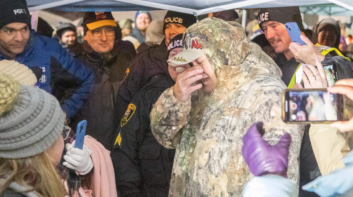 Sam Houston , 61, of Red Bud reacts after picking the Queen of Hearts and winning nearly $1.9 million in the Saints Peter and Paul Catholic School raffle in Waterloo Tuesday night.