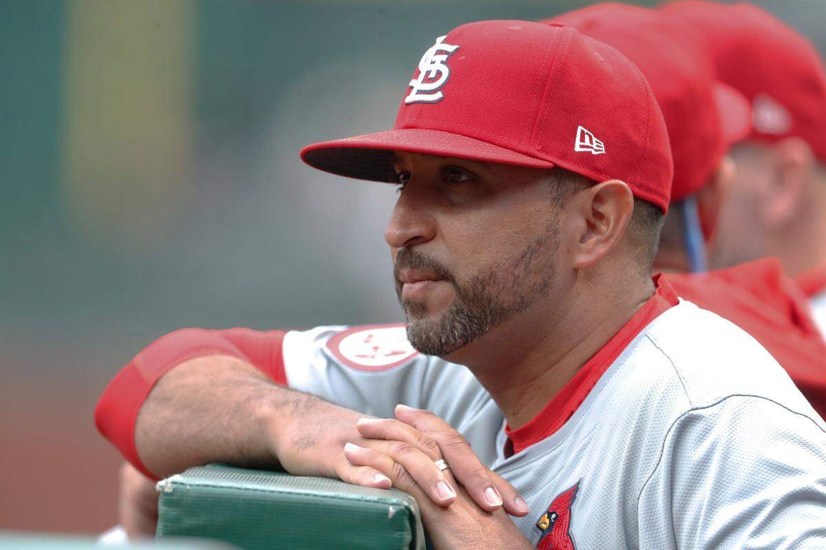 Jul 22, 2024; Pittsburgh, Pennsylvania, USA;  St. Louis Cardinals manager Oliver Marmol (37) looks on from the dugout against the Pittsburgh Pirates during the first inning at PNC Park. Mandatory Credit: Charles LeClaire-USA TODAY Sports
