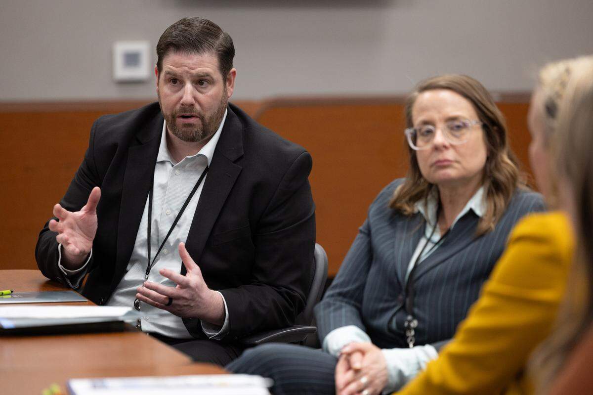Chestnut Health System’s Chief Administrative Officer Tony Coletta, Vice President of Integrated Care Amy Gibbar and other leaders from the nonprofit speak with U.S. Rep. Nikki Budzinski about their concerns regarding potential cuts to Medicaid.