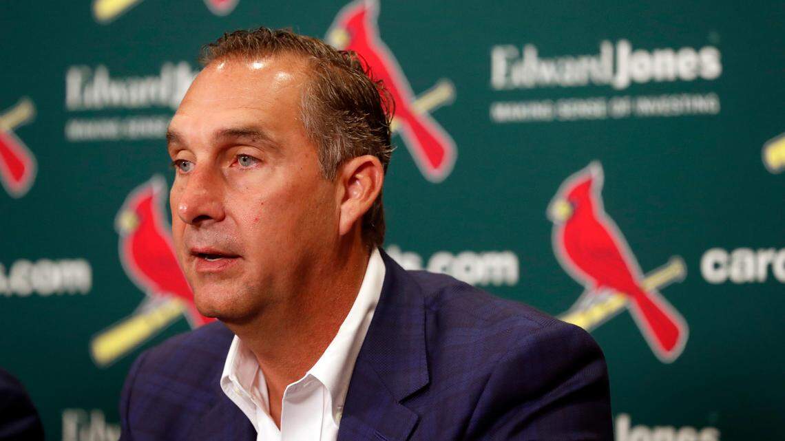 Just what did John Mozeliak do to earn a contract extension from the St. Louis Cardinals?
