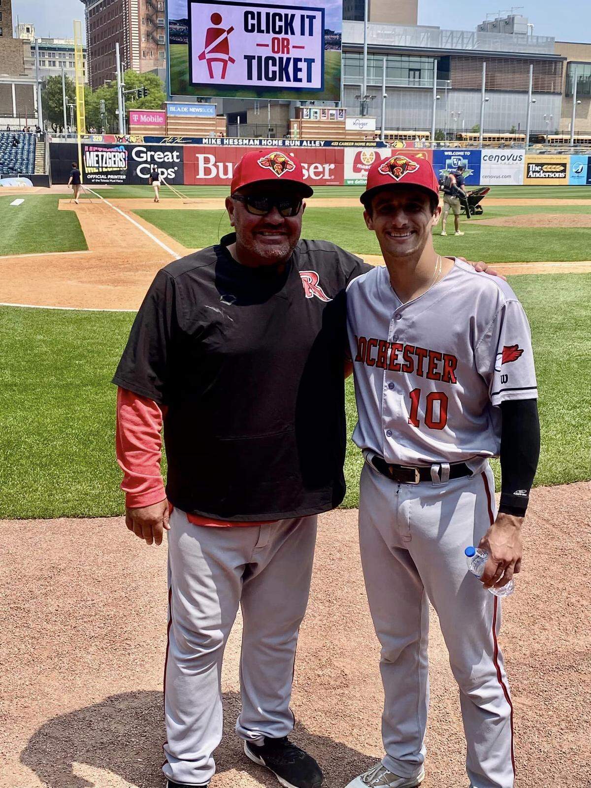 Belleville East graduate Drew Millas, right, was recently called up to the Rochester Red Wings, the Triple-A affiliate of the Washington Nationals. His hitting coach for the Red Wings is Belleville West graduate and former Boston Red Sox star Brian Daubach, left.