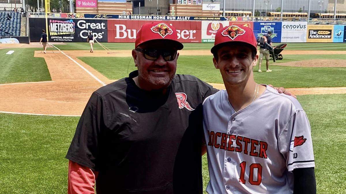 Belleville East graduate Drew Millas, right, was recently called up to the Rochester Red Wings, the Triple-A affiliate of the Washington Nationals. His hitting coach for the Red Wings is Belleville West graduate and former Boston Red Sox star Brian Daubach, left.