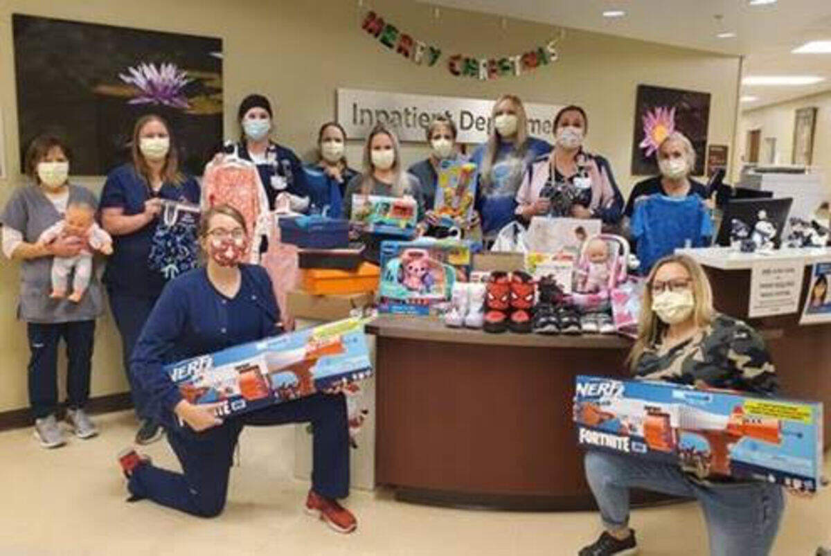 Each year, HSHS St. Joseph’s Hospital Highland colleagues look forward to partnering with the Highland Area Christian Services Ministry (HACSM) to adopt families for Christmas. This past Christmas, St. Joseph’s colleagues made the holidays brighter for five local families. Pictured are inpatient department colleagues who teamed up to support one of the families. Front row, from left, Megan Buller, RN, and Lyndsey Gelly, RN; back row, Nancy Ramsey, PCT; Kaylin Ravenscraft, RN; Julie Matlock, RN; Irene Siebert, RN; Michelle Herzberg, director of inpatient services; Robyn Furry, CNA; Caitlin Kuper, RN; Lindsey Emrich, RN; and Emily Duffin, RN. For more information about HSHS St. Joseph’s Hospital Highland, visit the hospital’s website at stjosephshighland.org.