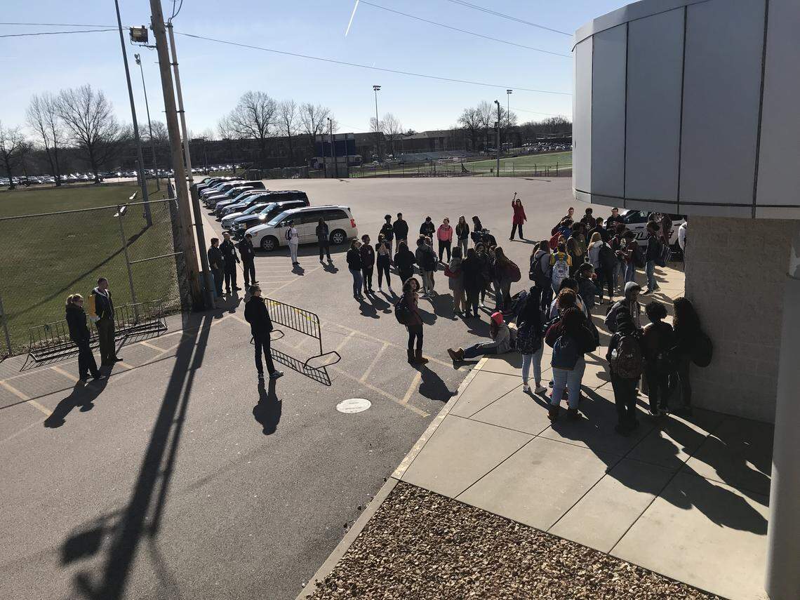 At 10 a.m. Wednesday, March 14, in the rear of O'Fallon Township High School Smiley campus, 600 S. Smiley St., roughly 50 student​s walked out of classes as a part of a national protest to support the 17 people who died as a result of a school shooting in Parkland, Fla., despite warnings from the plans by OTHS District 203 administration to issue disciplinary action.