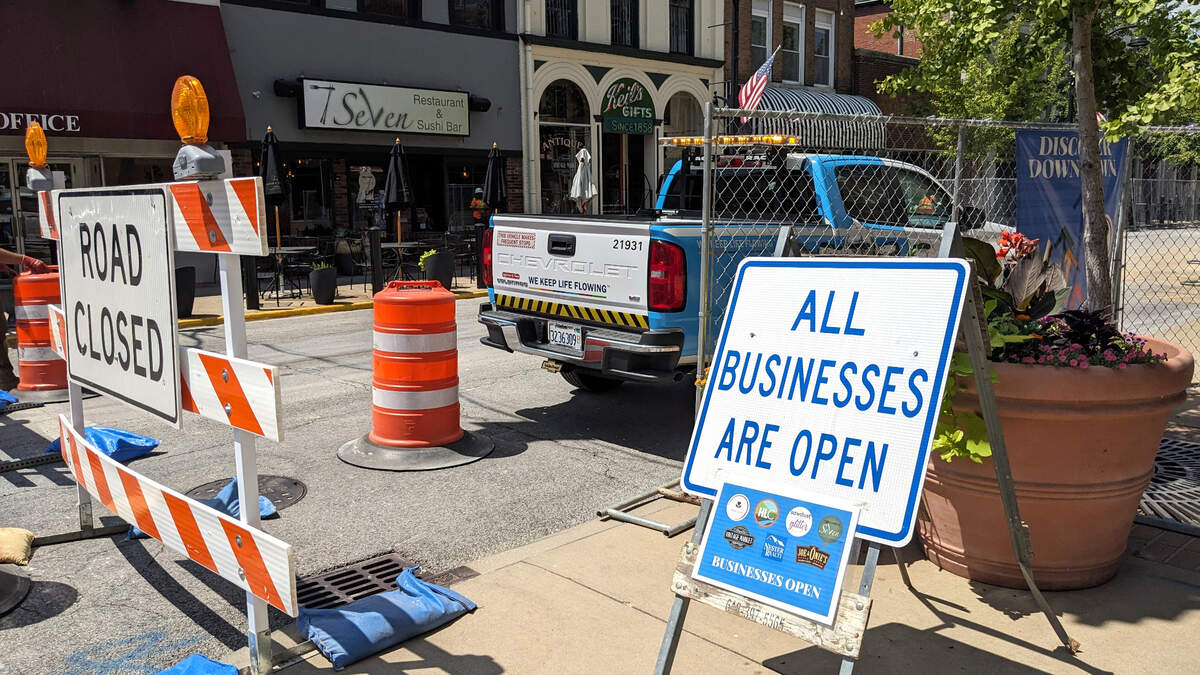 The businesses along East Main Street in downtown Belleville remain open during the update of water lines under the Veterans Memorial Fountain. Businesses are accessible by sidewalk.