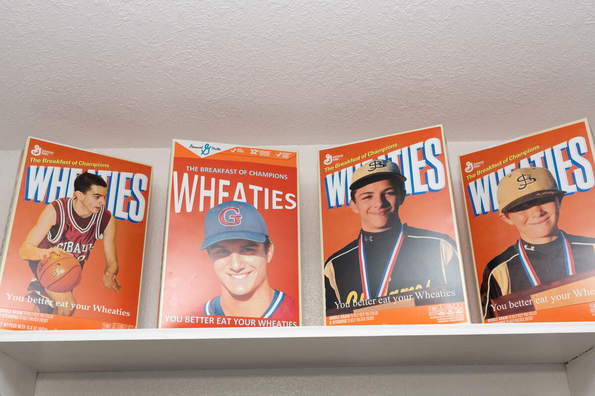 The McFarlan brothers often create props for their Christmas photoshoots, such as these boxes of Wheaties featuring images of their children.