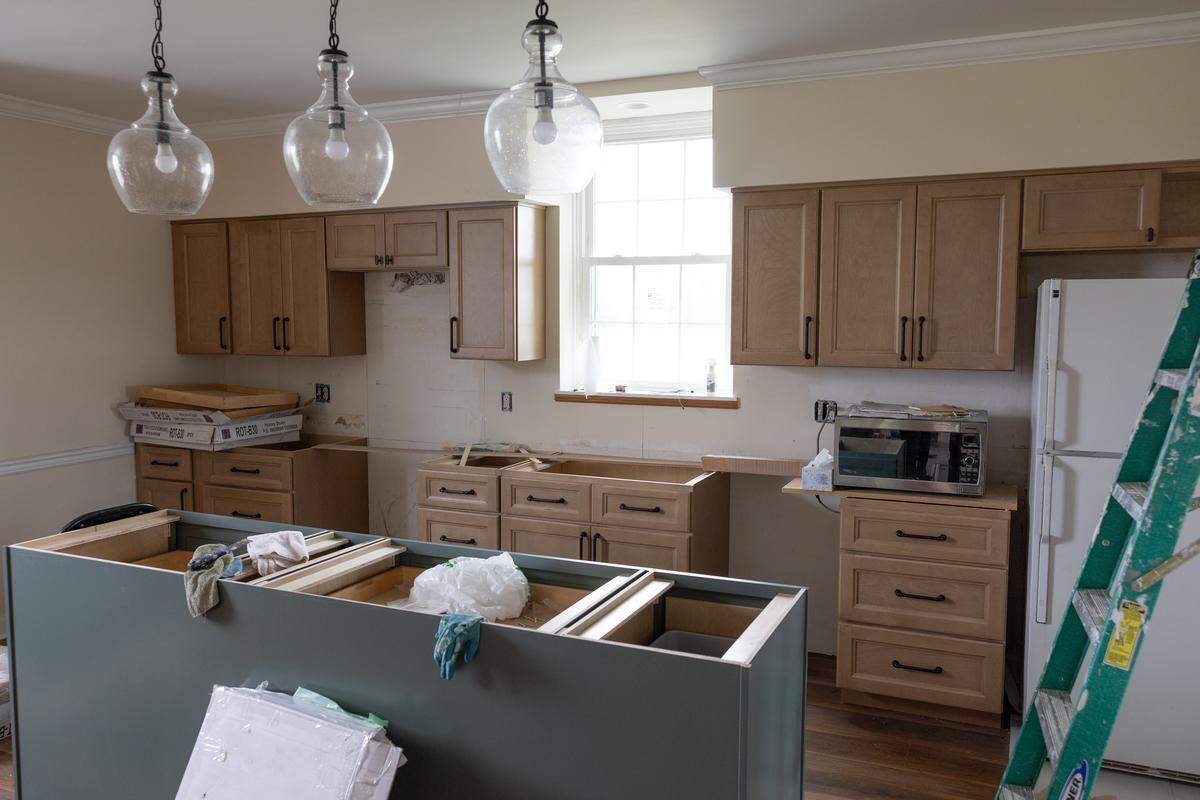 Contractors are renovating a farmhouse at the Belleville location of Karla Smith Behavioral Health, an organization that provides outpatient mental health treatment. The kitchen, complete with new cabinets, will be used for community meal preparation.