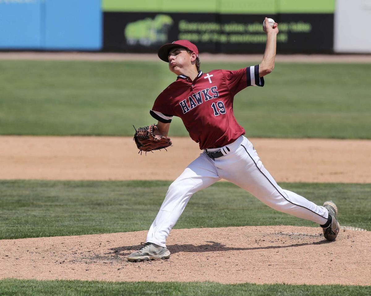 Gibault’s Brady Biffar delivers a pitch during Saturday’s IHSA Class 1A state championship game against Henry H-Senachwine at Dozer Park in Peoria. Gibault went on to an 8-0 win to secure the state crown.
