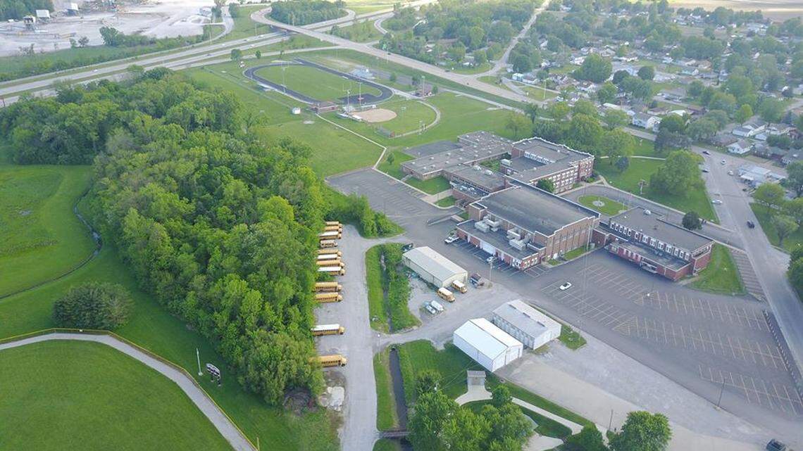 A Dupo school and homes are pictured in this 2019 file photo.