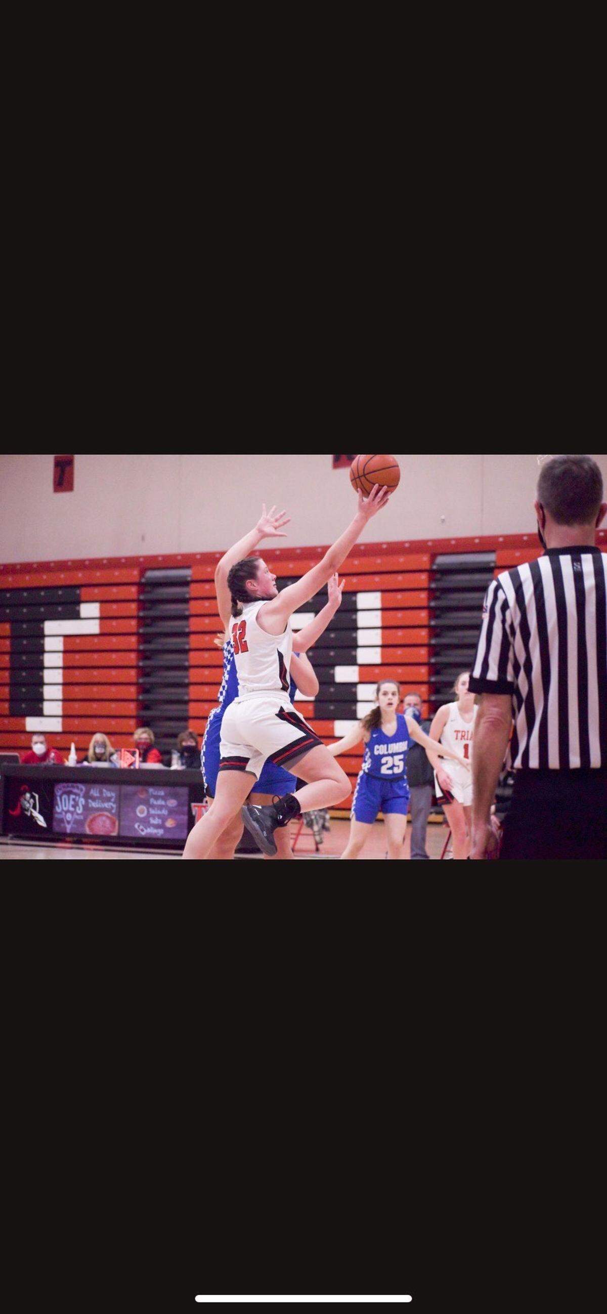 Triad High School’s Reagan Chigas goes up for a basket during a game this season. Chigas is the winner of this week’s Belleville News-Democrat Girls Player of the Week high school basketball poll, as selected by readers of bnd.com.
