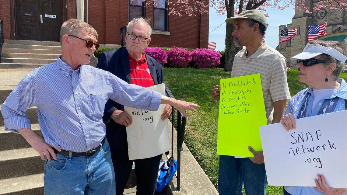 David Clohessy, left, speaks during a news conference Wednesday in Belleville when members of the Survivors Network of those Abused by Priests said they want the Belleville Diocese to add five names to the clergy sex abuse list. Joe Dahlem, Melvin Gilchrist and Margaret-Mary Moore, all of St. Louis, are shown with Clohessy.