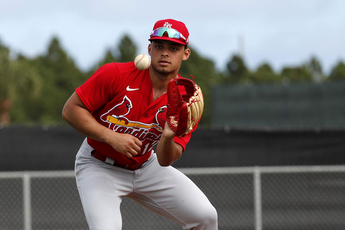 St. Louis Cardinals pitcher Jordan Hicks catches a ball during spring training baseball practice Sunday, Feb. 16, 2020, in Jupiter, Fla. (AP Photo/Jeff Roberson)
