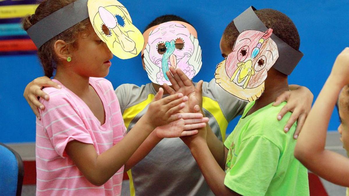 Mya Alston, Nasir Fares and Jace Strickland play in the pre-kindergarten and first-grade class at the Growing Scholars Summer Camp in Fairview Heights.