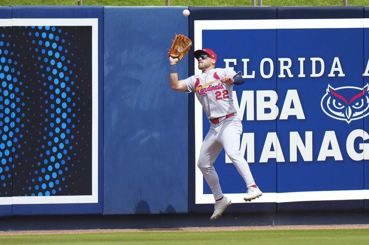 Mar 4, 2025; West Palm Beach, Florida, USA; St. Louis Cardinals outfielder Michael Siani (22) catches a fly ball for an out against the Washington Nationals during the second inning at CACTI Park of the Palm Beaches. Mandatory Credit: Rich Storry-Imagn Images
