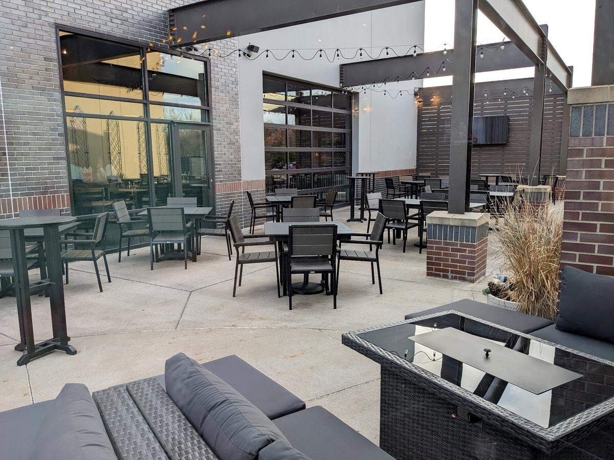 Brick + Bramble shares a patio with Global Brew Tap House. Both businesses are owned by Ryan and Laura High.